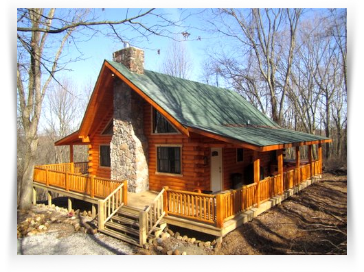 Country Dreams Cabin log cabin with wrap around porch and green roof