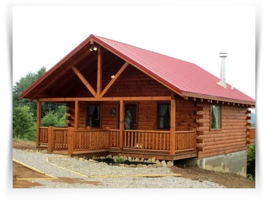 Log cabin with wrap-around porch and red roof