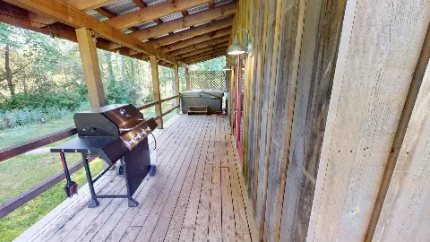 Back deck with gas grill and hot tub