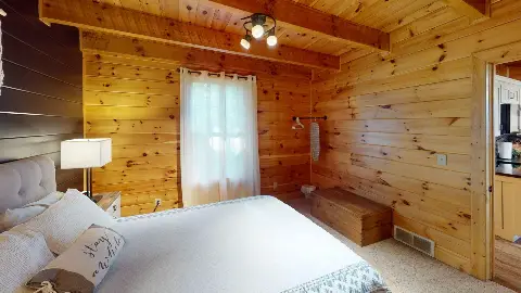 Bedroom window, storage chest and closet rod